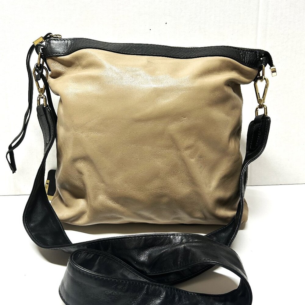 Innue leather tan and brown crossbody bag